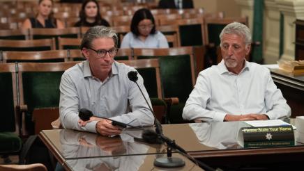 Tom Richards, Butte County Grass Fed Beef Rancher, and Blaine Carian, Vice President of Desert Fresh Inc., speak at a California Agricultural Competitiveness Hearing.
